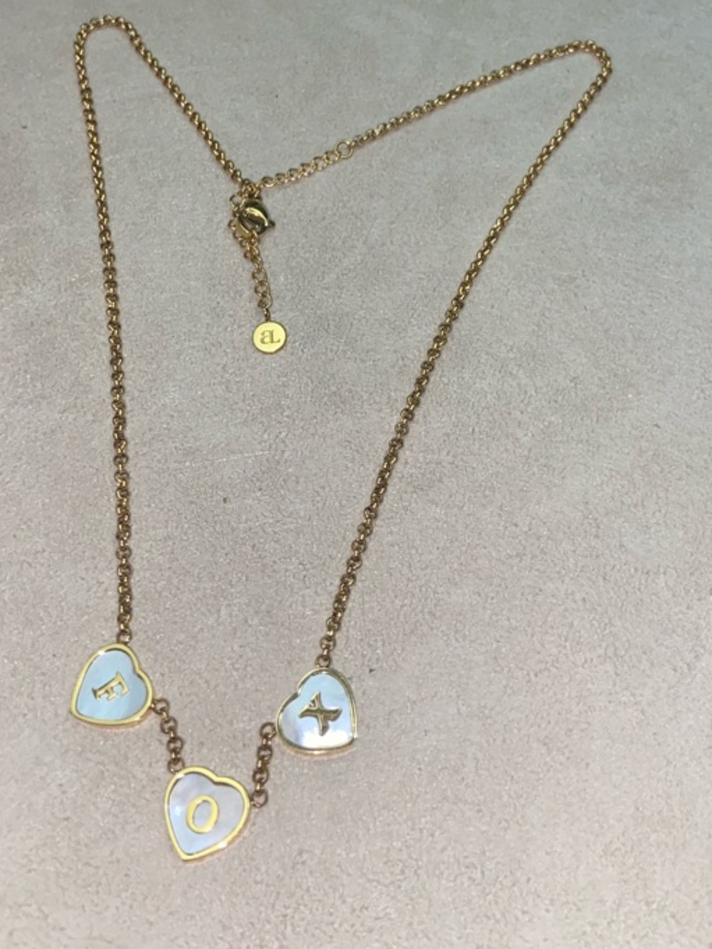 Abbott Lyon Gold-Tone Heart Initial Necklace with White Enamel Hearts